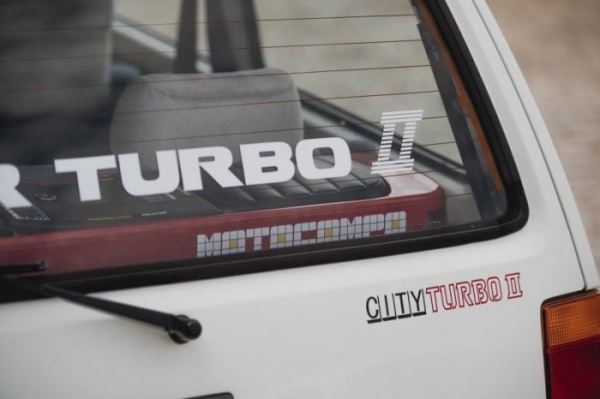 <br />
			Honda City Turbo II со скутером Motocompo (17 фото)