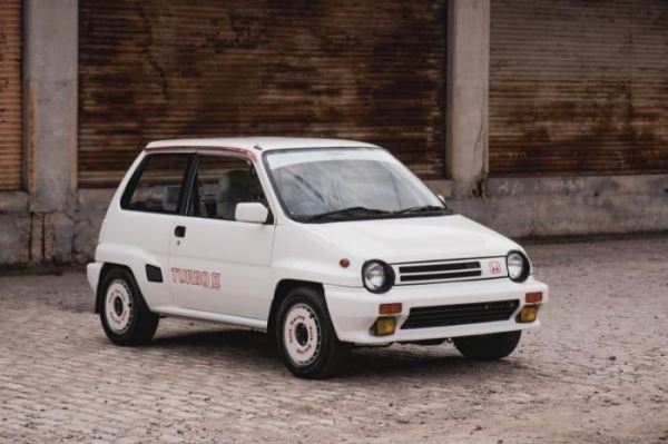 <br />
			Honda City Turbo II со скутером Motocompo (17 фото)